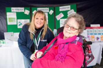 two women promoting Health watch 